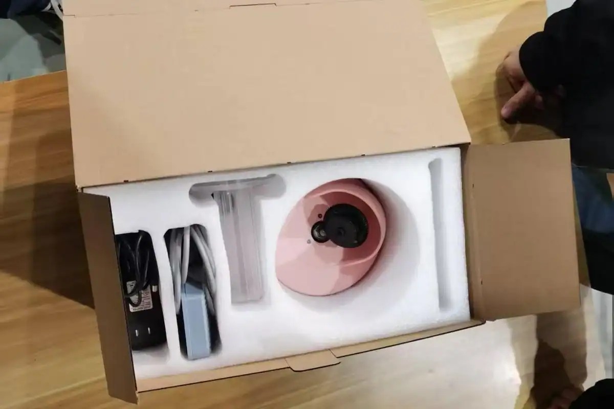 Retail carton with a die-cut foam insert checked for fit around a finished product and its accessories