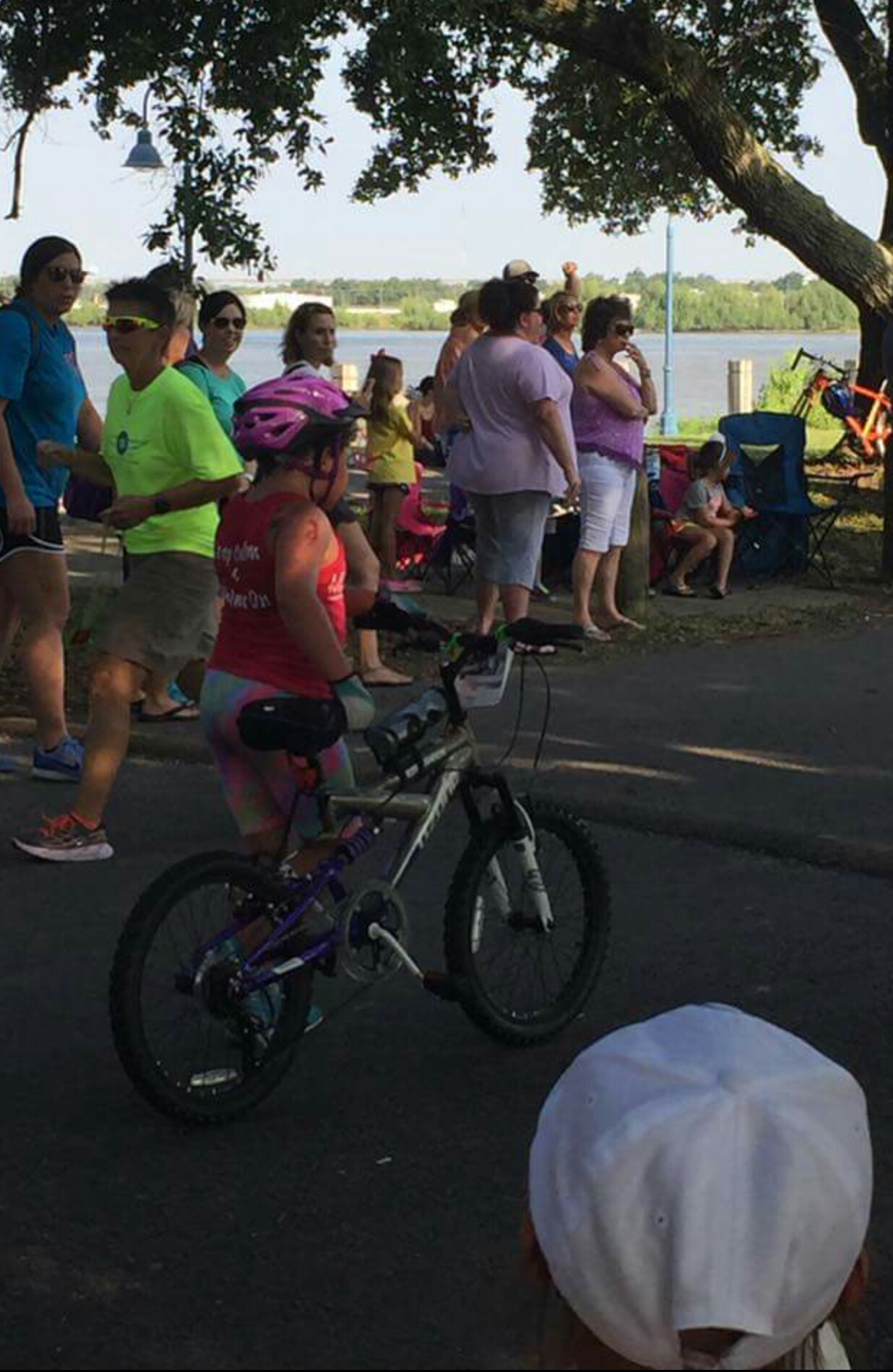 Rosie in her "Fight Like a Girl" Cap that Lizzy gave to her watching as Lizzy is about to take off for the 3 Mile Bike!