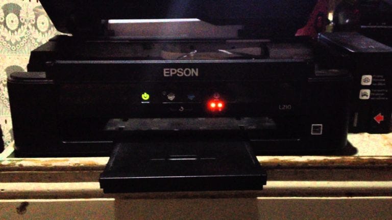 Moderately beating one end of your paper heap until all of the sheets sit consistently in the tray. Annoyed By A Red Blinking Light In Your Epson L210 Printer Get To Know What Does It Mean And Fix It On Your Own With Our Solutions By Uae Technician Ae