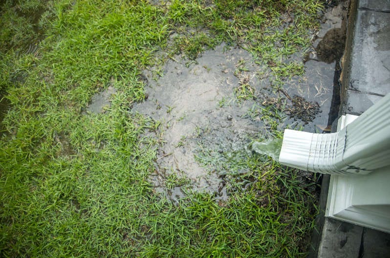 How do i divert water away from my house?
