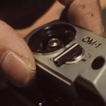 OM-1 side