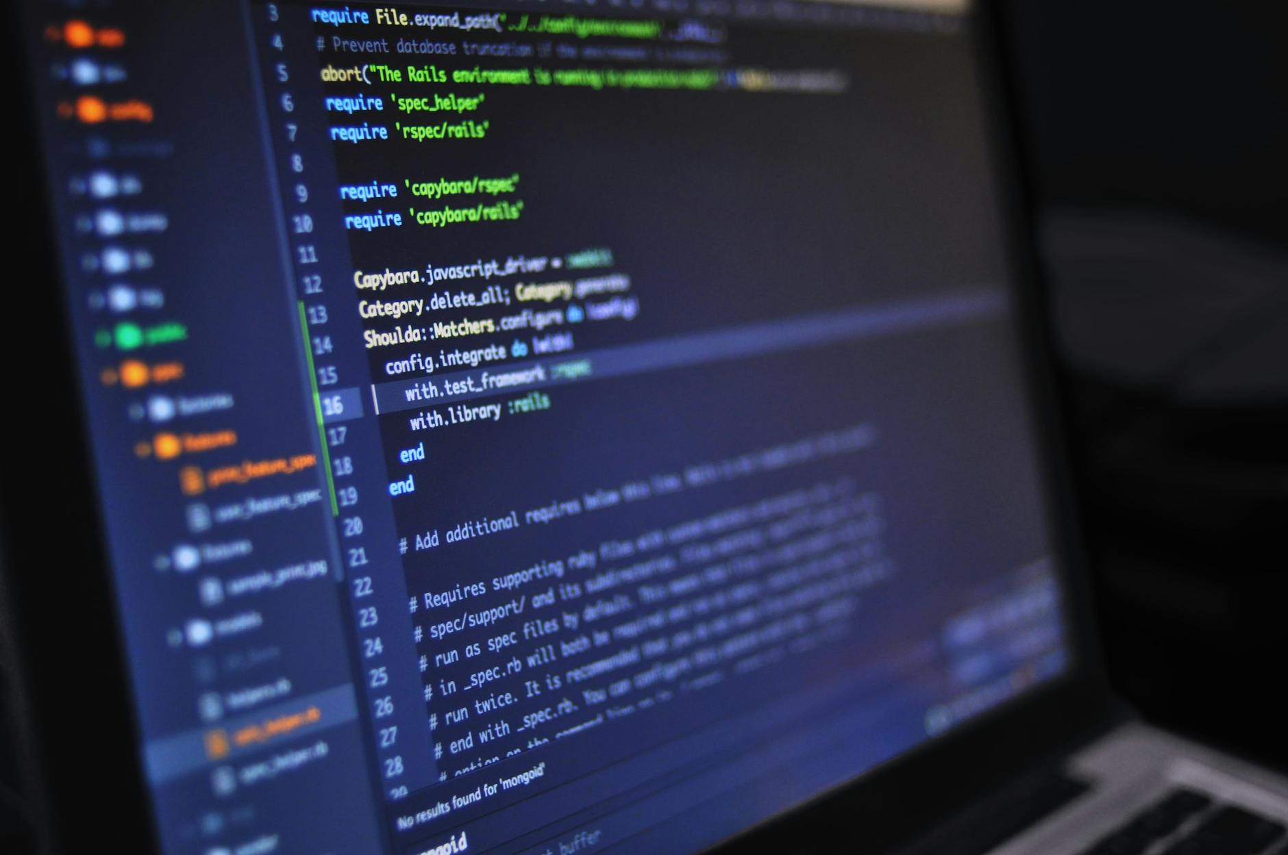 A person working on a computer with code on the screen, representing a contract developer