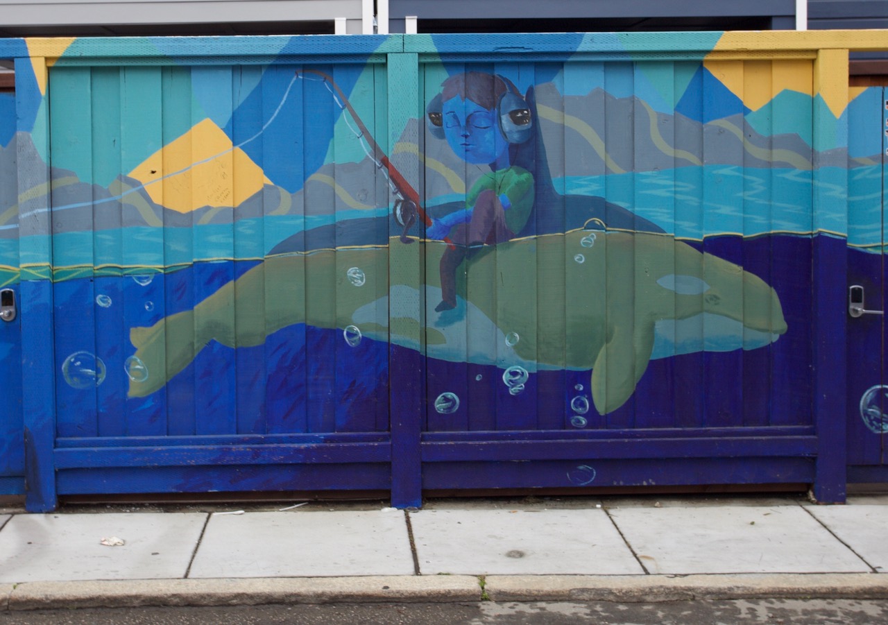 Gone fishing. Girl on a whale and fishing