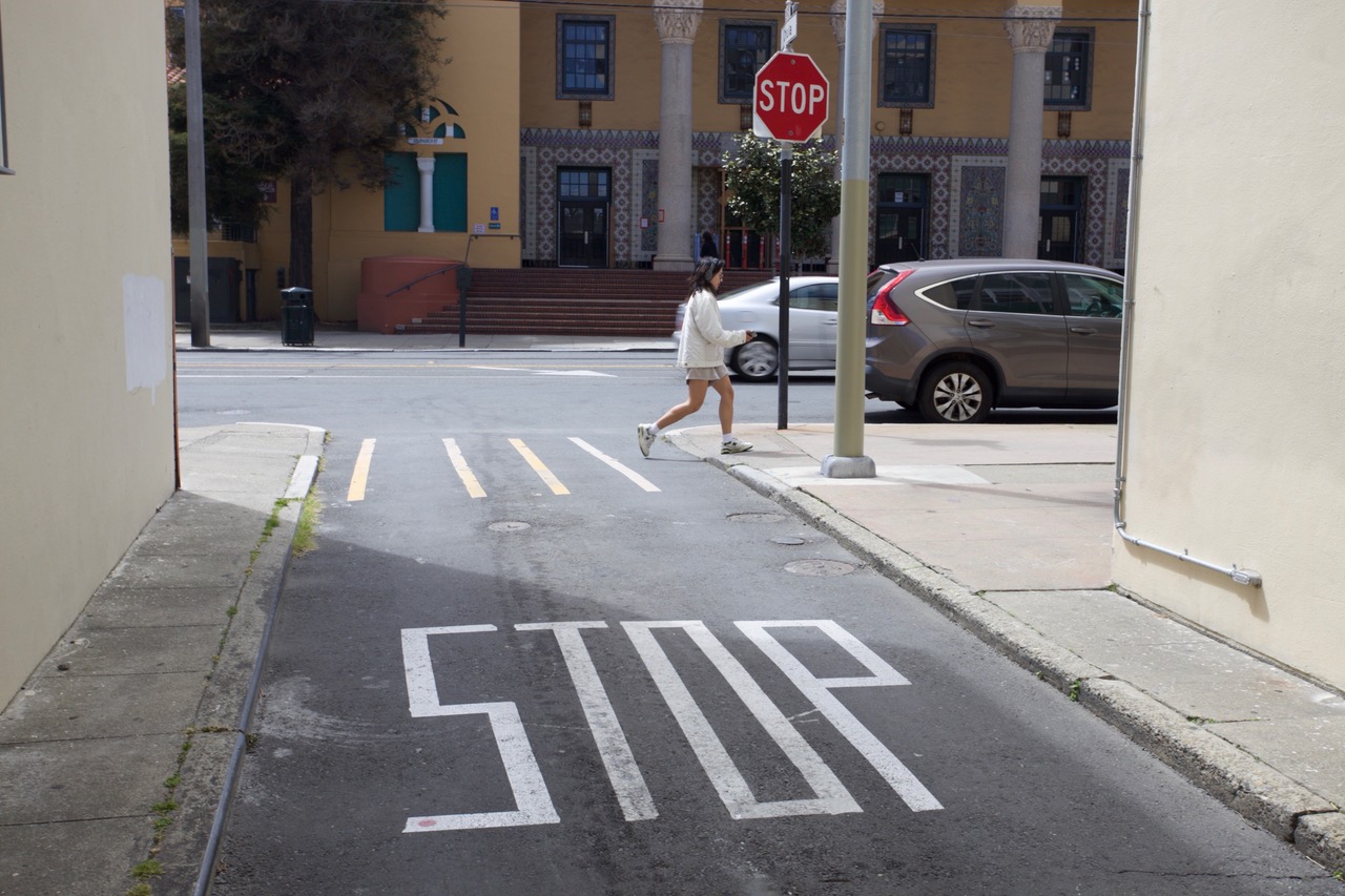 Horace Mann in the Background. Stop sign