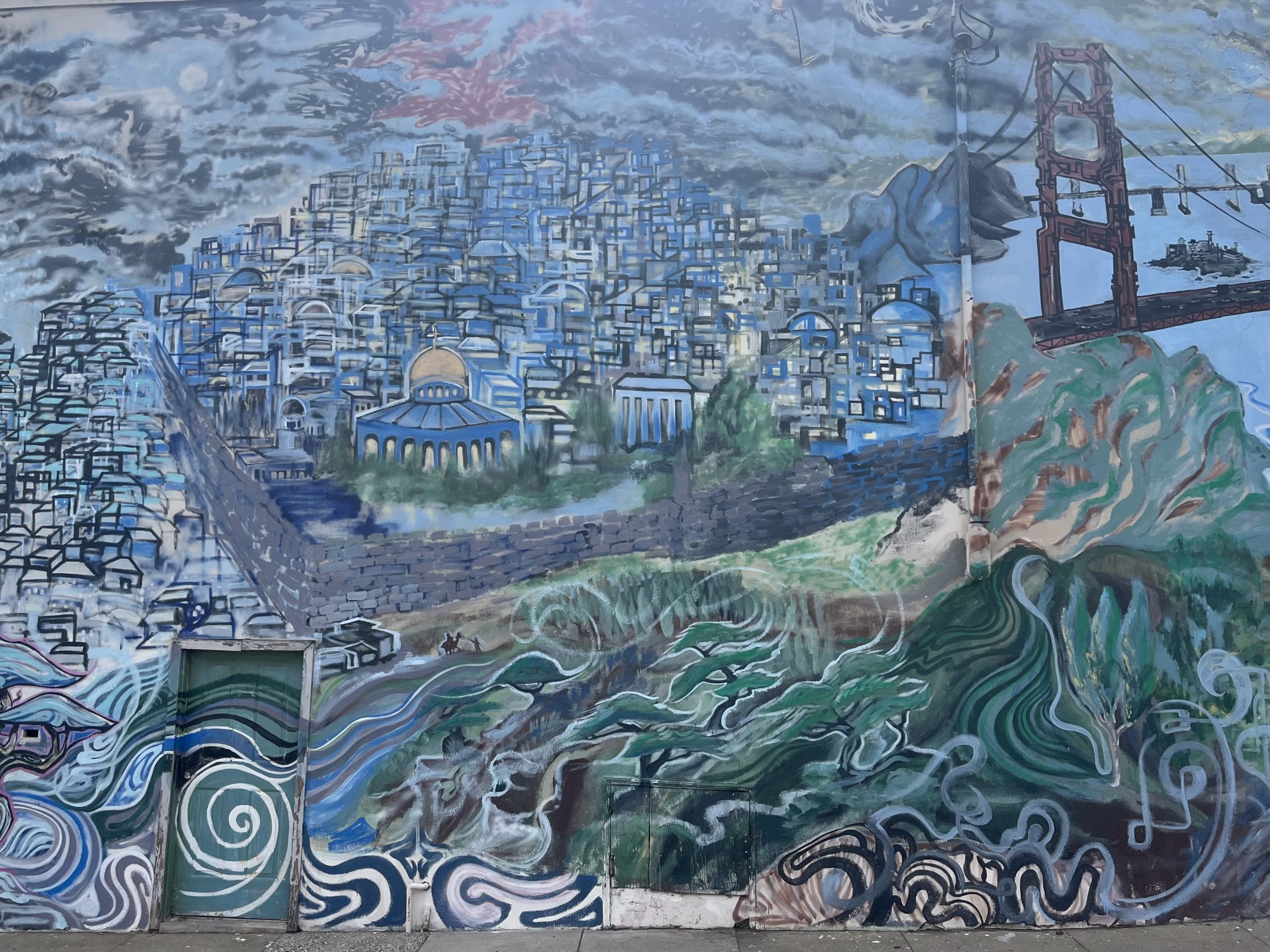 A colorful mural depicts a densely packed cityscape with domed buildings, a suspension bridge, swirling water, and abstract patterns blending together.