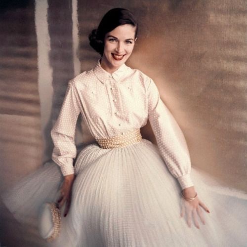 1955 Model in dress with yellow dotted cummerbund by Brigance of Sportsmaker