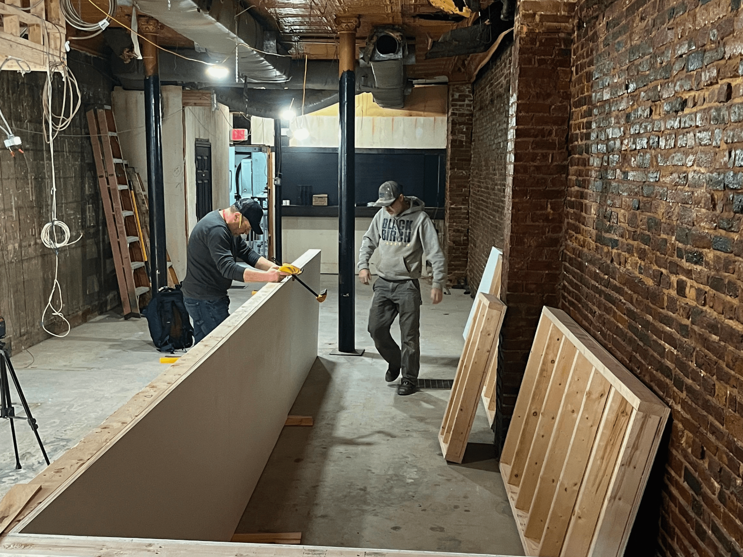 Construction crew working on commercial renovation project managed by MMC Construction Management.