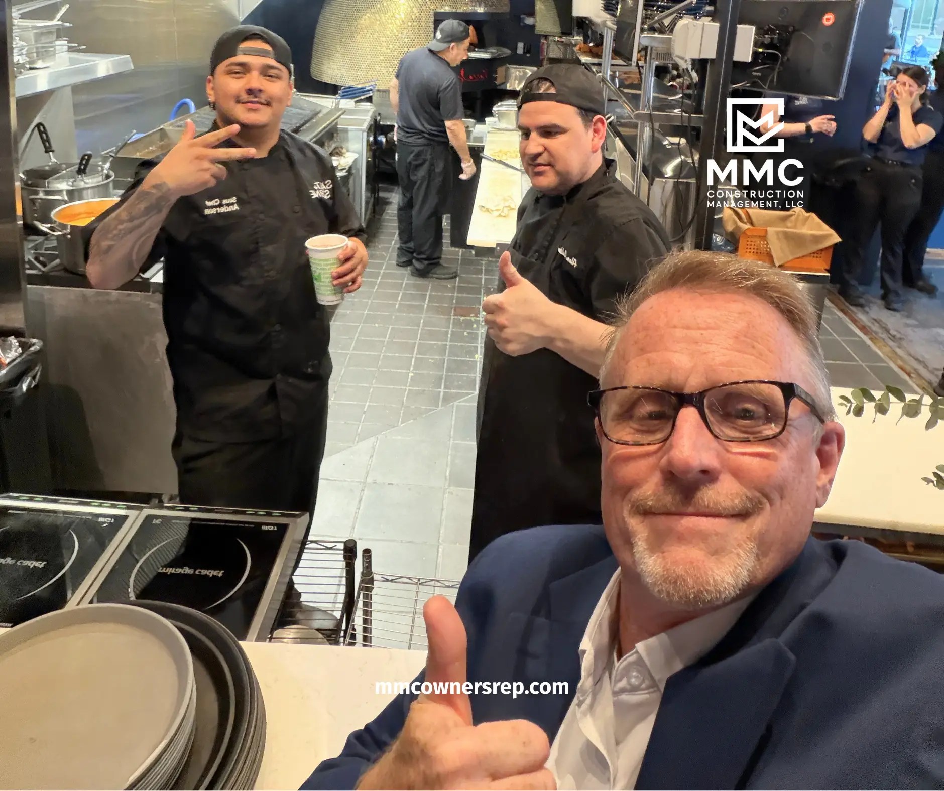 Marc Champagne, Owner of MMC Construction Management, taking a selfie during the Salt + Stone grand reopening celebration at Assembly Row