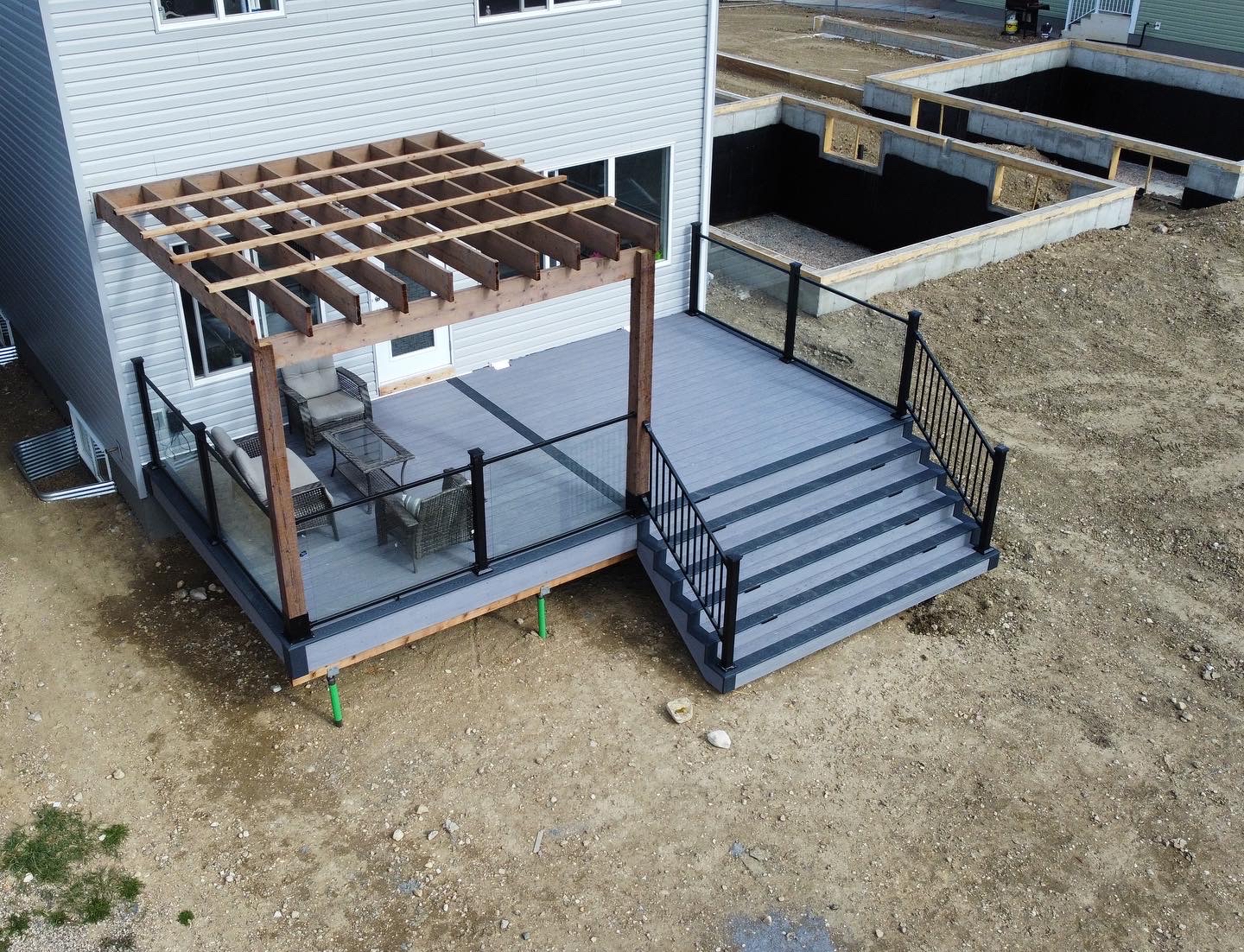 custom deck installation with pergola