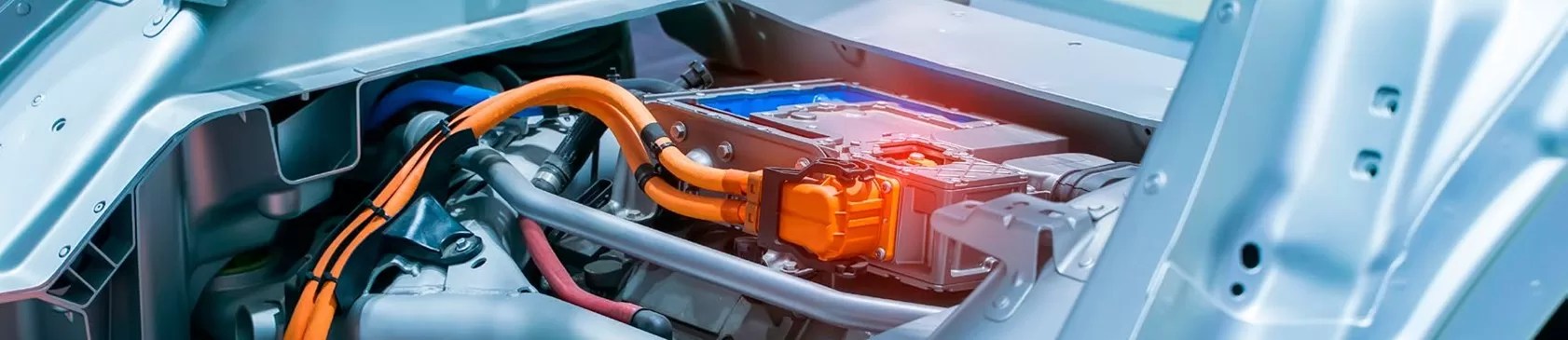 High-voltage battery pack and power electronics inside electric vehicle chassis for EV thermal management and energy efficiency.