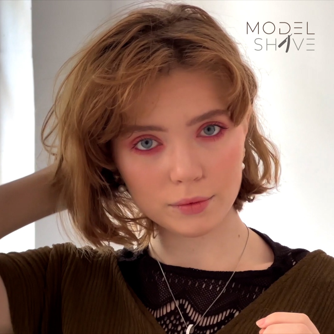 Pretty blonde shaved her head.