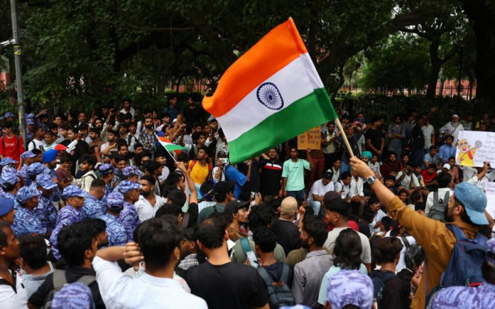 Tens of thousands of Gen Z protesters march in New Delhi as the 'Cockroach' movement pressures Modi's government over exam leaks and youth unemployment.