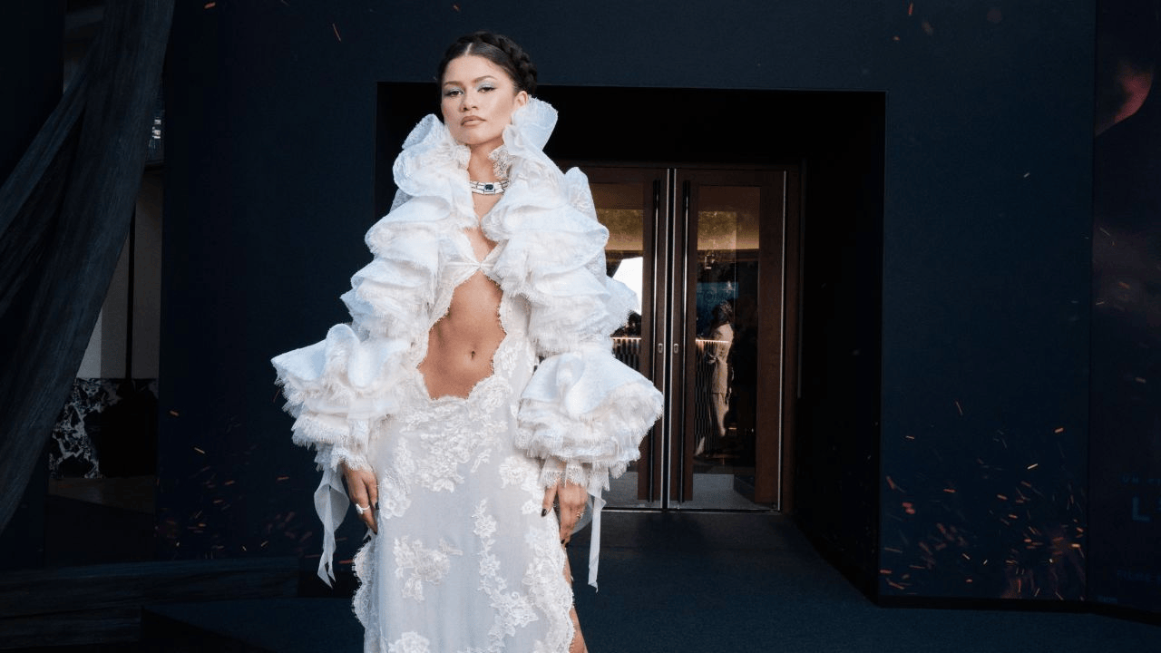Zendaya stuns in an 800-hour custom Louis Vuitton Grecian goddess gown at Paris premiere of Christopher Nolan’s upcoming cinematic epic, The Odyssey.