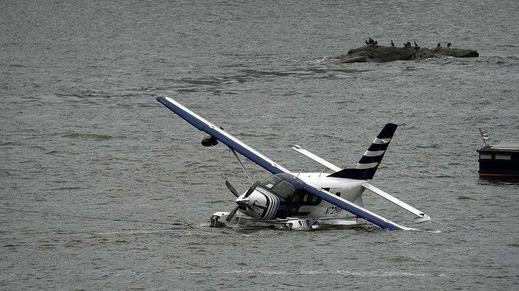 A Kodiak 100 seaplane carrying passengers from the Hamptons made a hard landing and partially capsized in New York City's East River.