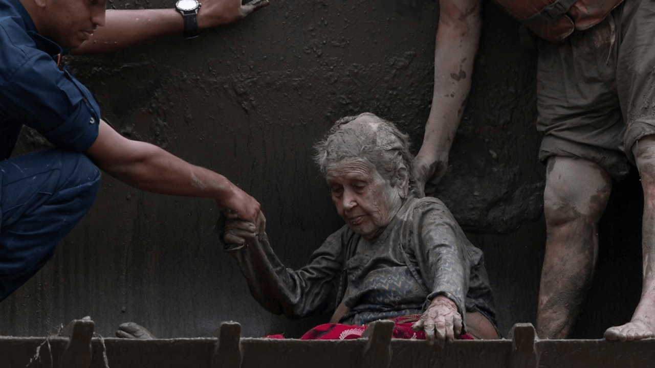 A 97-year-old woman survived terrifying floods in Nepal after heavy rains destroyed homes. Learn how brave rescuers carried her to safety.