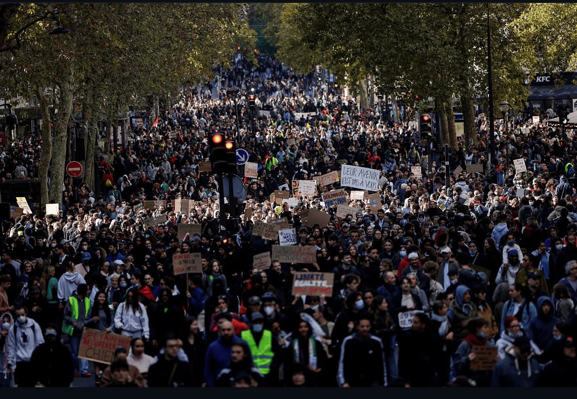 Violent clashes erupt across Paris and French cities as 500,000 protesters march against soaring inflation, leaving one demonstrator injured and shops looted.