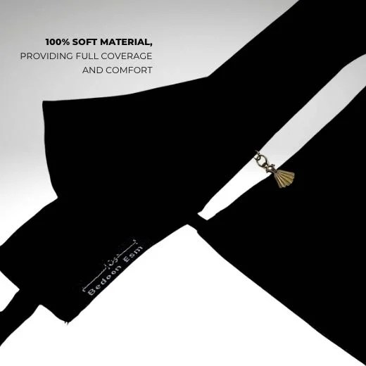 A luxury Imported Saudi niqab laid flat, displaying its elegant shape, color, and fine stitching. Modify.pk