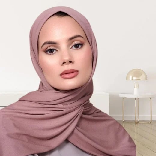 Jersey Hijab styled in a simple wrap, showcasing its fluid drape. Modify.pk