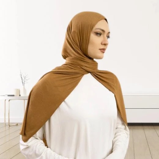 Jersey Hijab styled in a simple wrap, showcasing its fluid drape. Modify.pk