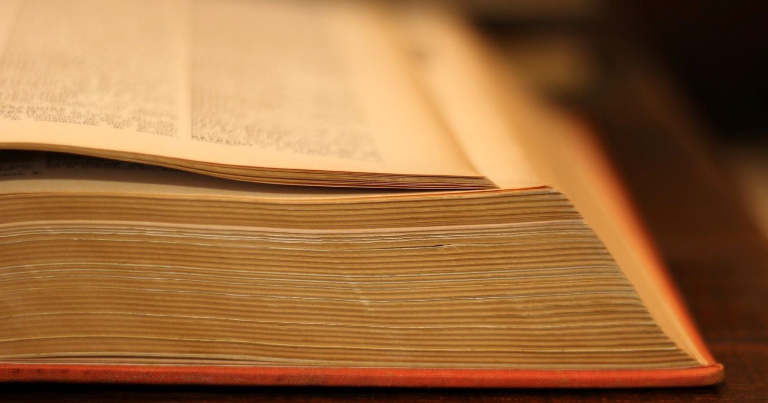An open thick old book.