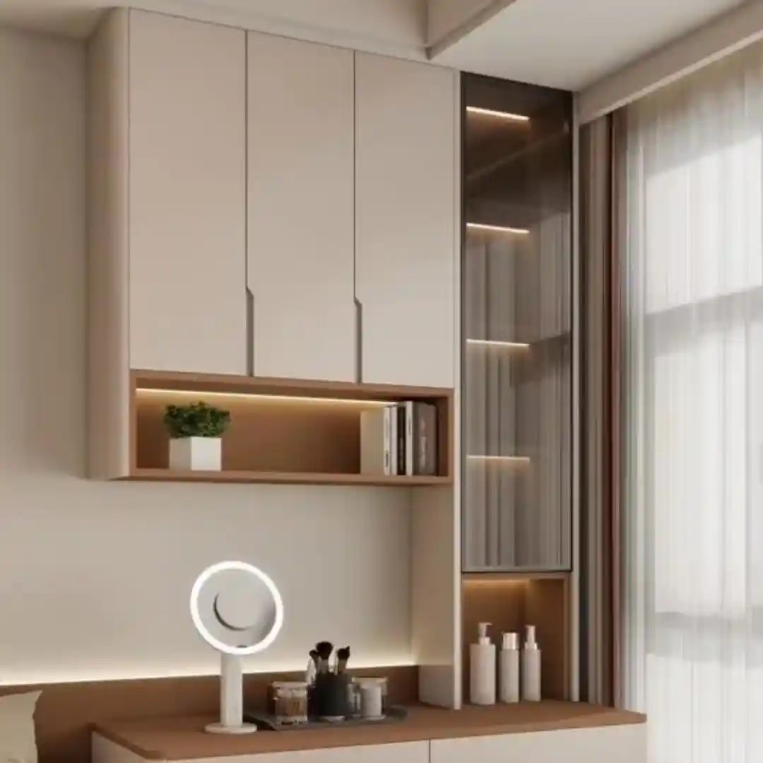 Modern bedroom vanity with built-in cabinets, LED lighting, glass shelves, and round mirror — sleek storage desig
