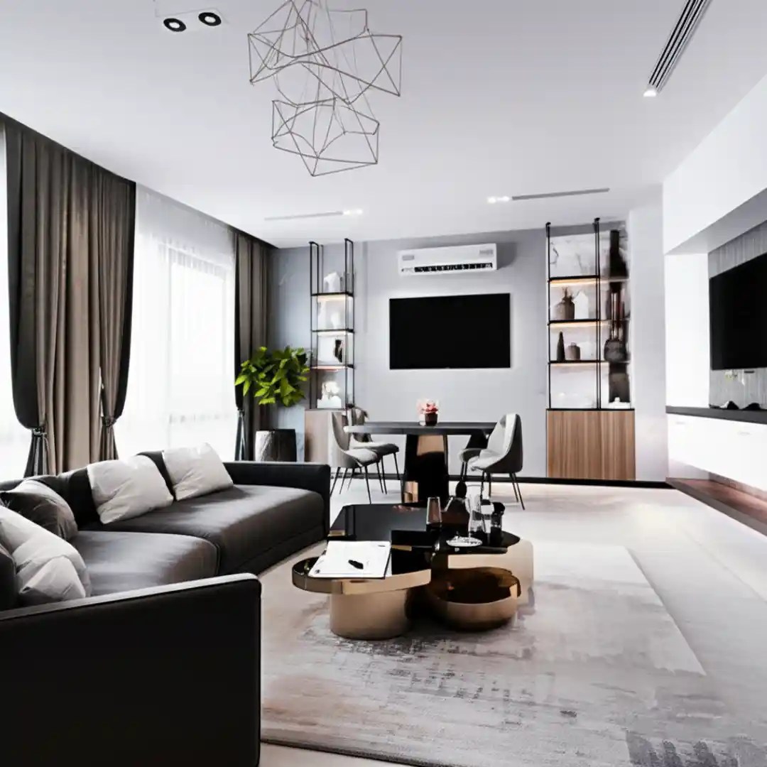 Modern living room with black sofa, geometric chandelier, and open-plan design, ideal for homes in Delhi, Gurgaon, and Noida