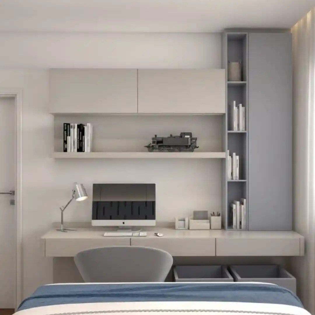 Modern bedroom study unit with floating desk, shelves, cabinets, monitor, and gray chair — sleek home office design