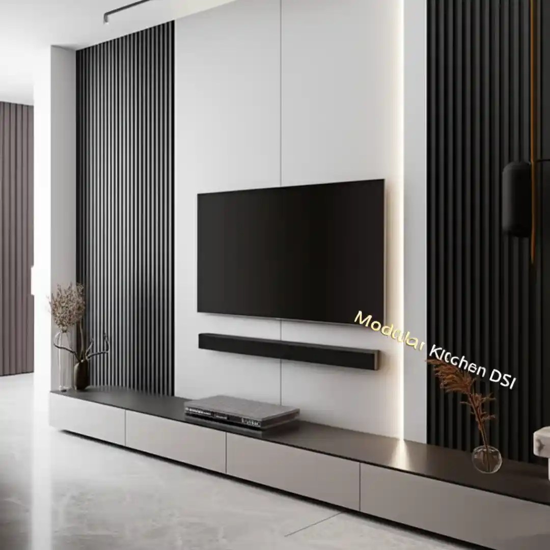 Modern TV wall with black slat panels, LED lighting, floating cabinet, and minimalist design — sleek living room setup