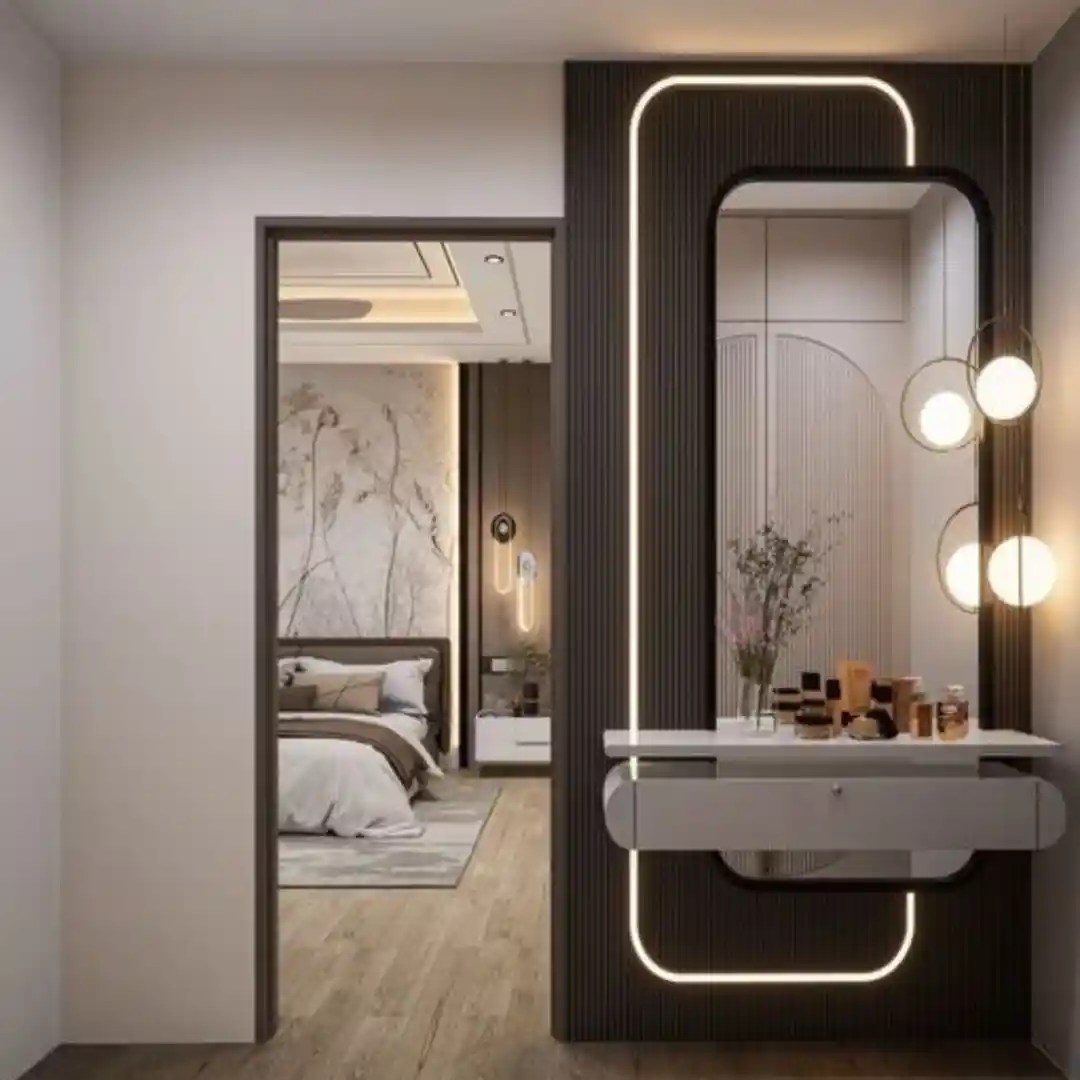 Modern vanity with LED mirror, floating table, pendant lights, and dark wood panel — sleek bedroom design