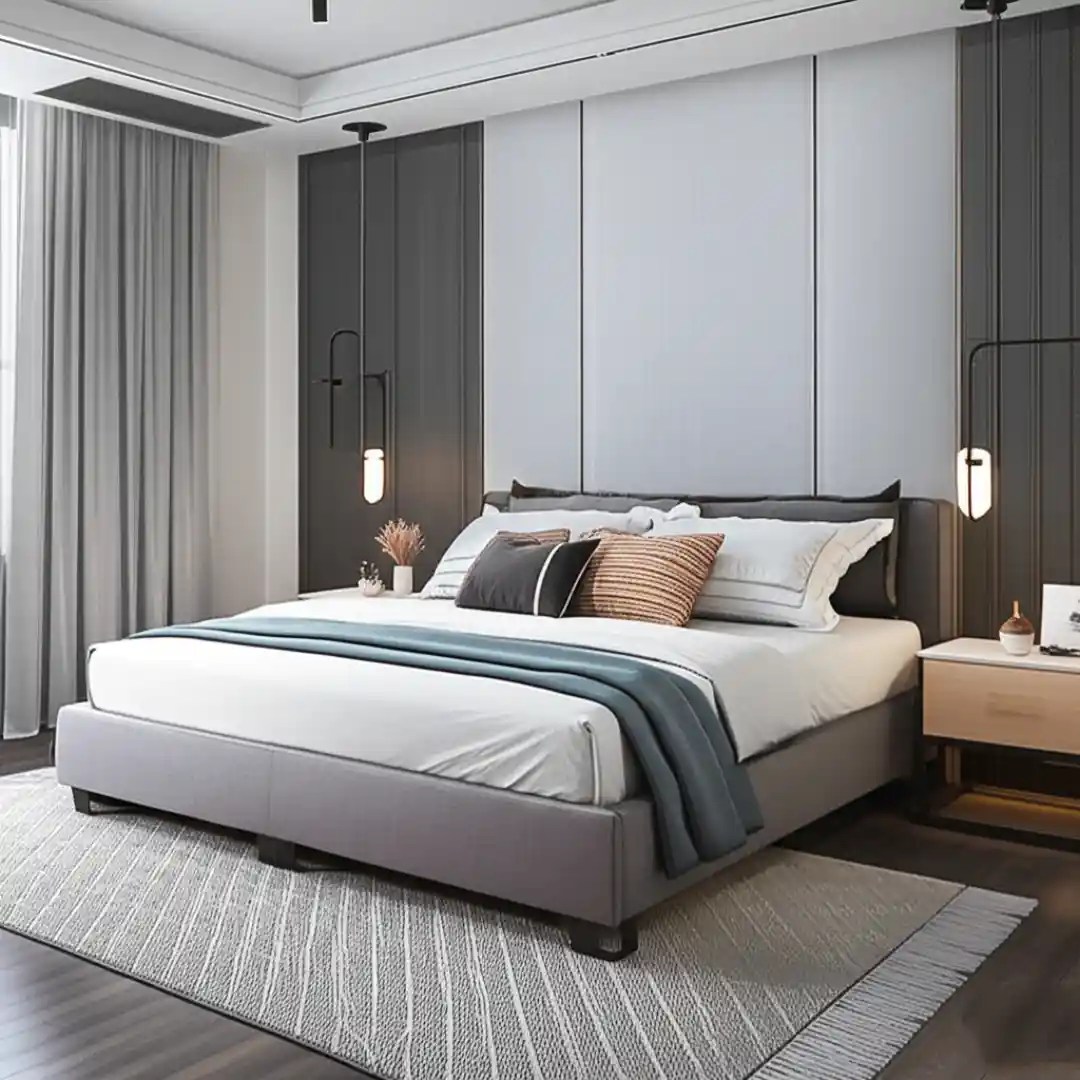 Modern bedroom with gray bed, panelled wall, pendant lights, wooden floor, and neutral decor — minimalist design