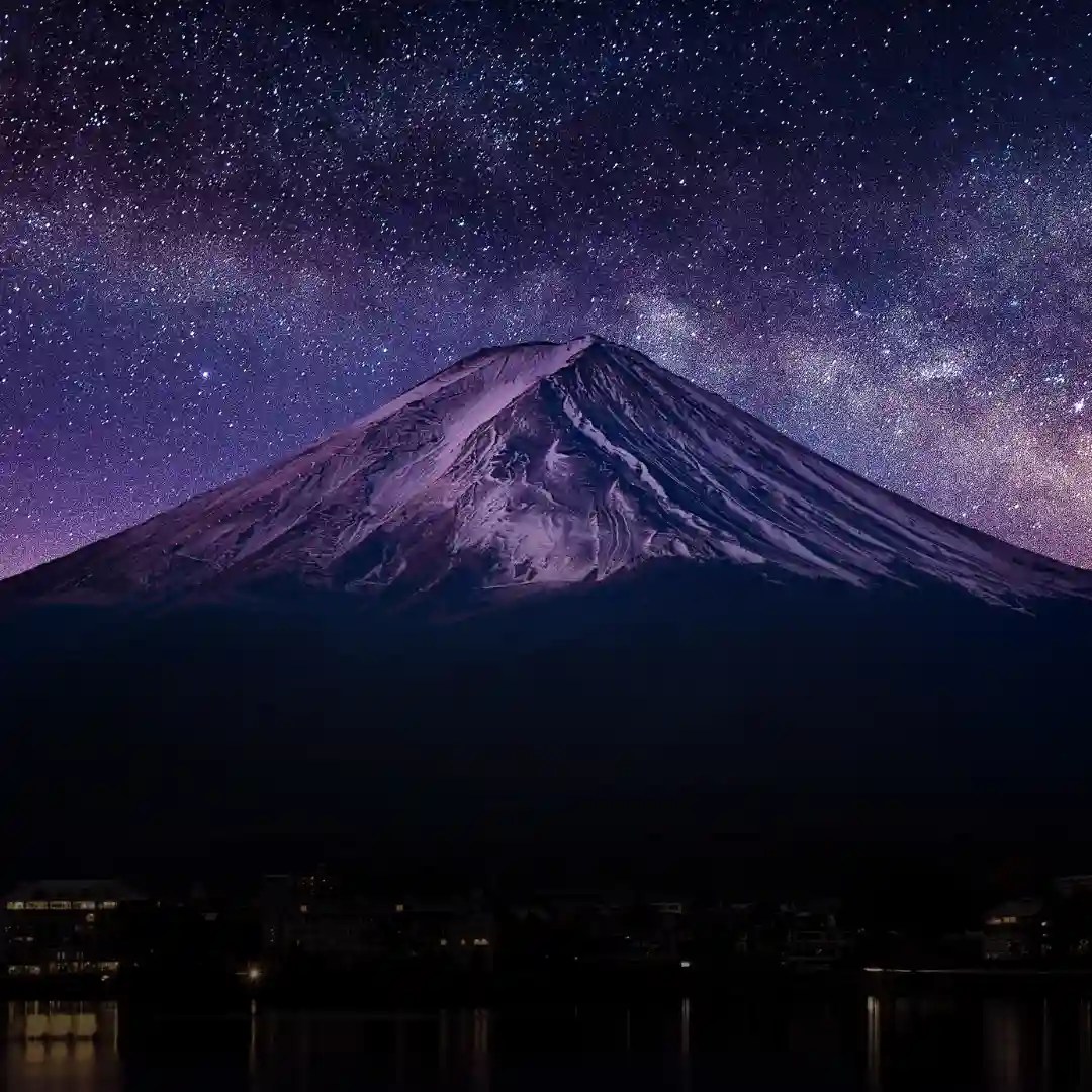 Mount Fuji under a starry night sky with the Milky Way, ideal for nature and astronomy lovers in Delhi, Gurgaon, and Noida