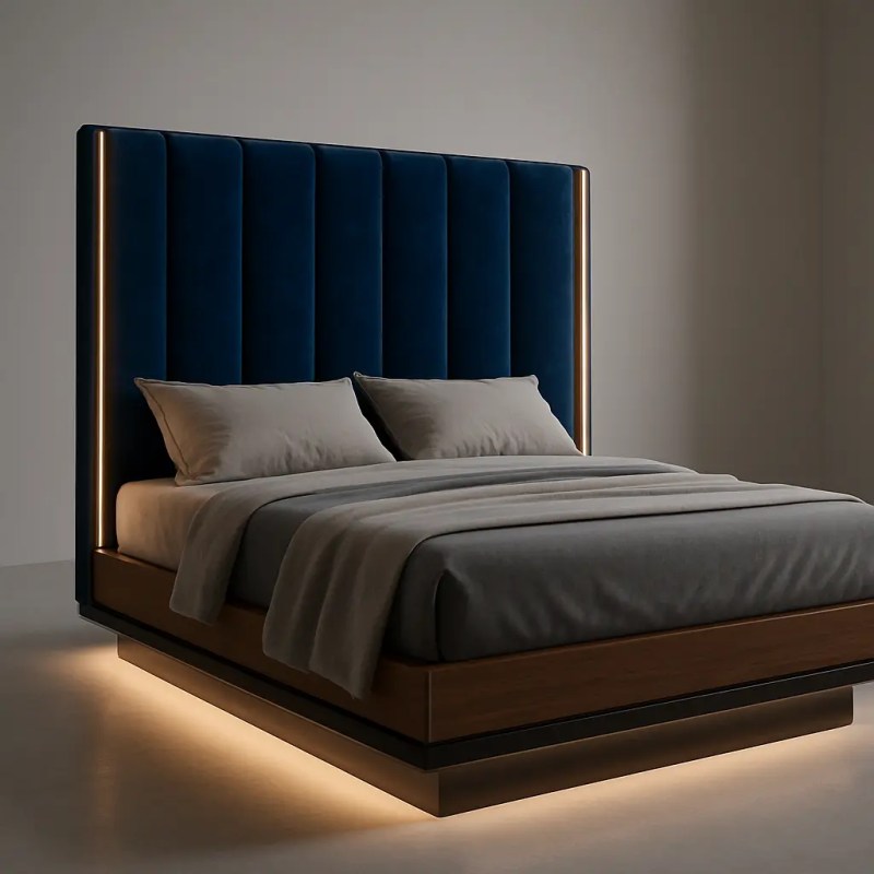 Modern LED bed with navy blue velvet headboard and warm underglow lighting, designed for luxury bedrooms in Delhi NCR