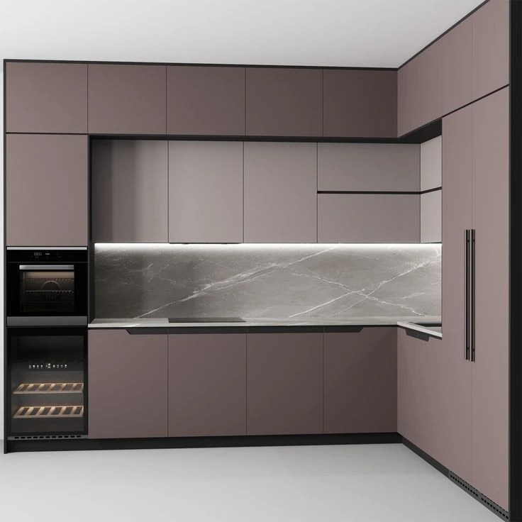 Modern kitchen with matte brown cabinets, a marble backsplash, and built-in appliances including an oven and wine cooler. Sleek design with hidden lighting.