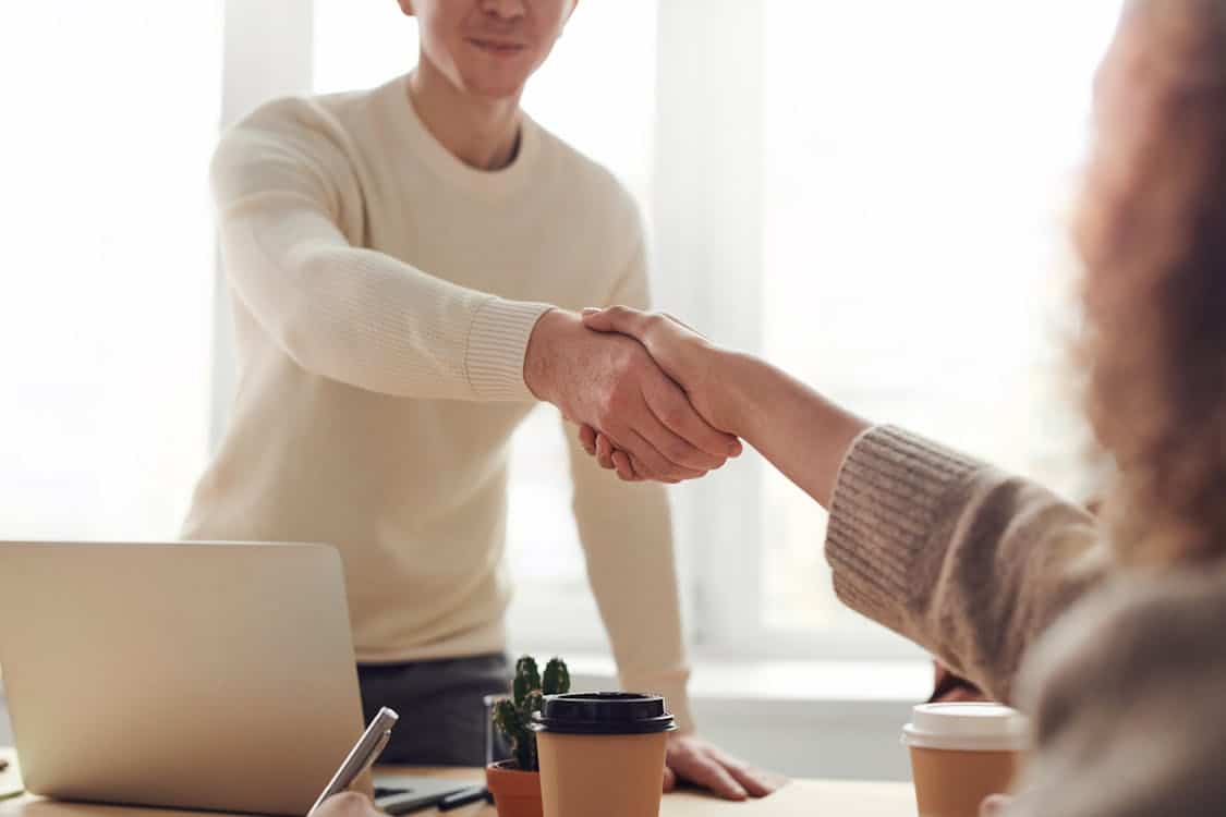 Small business owner choosing the right web developer