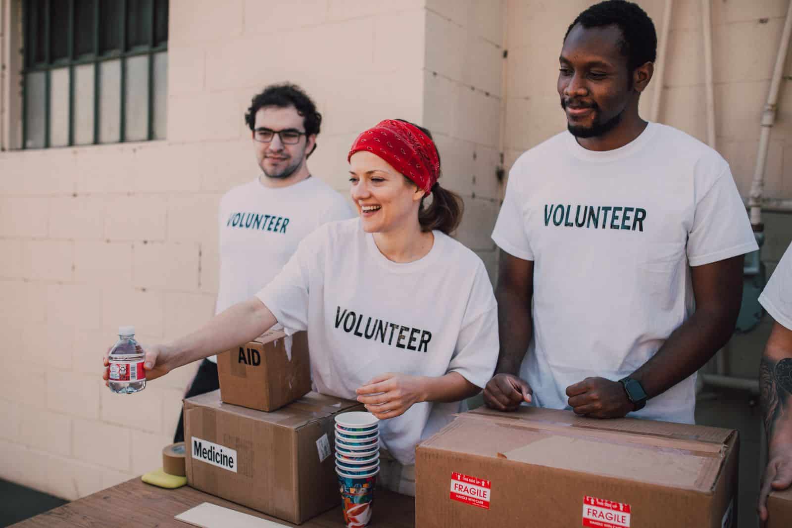 Volunteers packing donation boxes, representing nonprofit website design for Philadelphia organizations