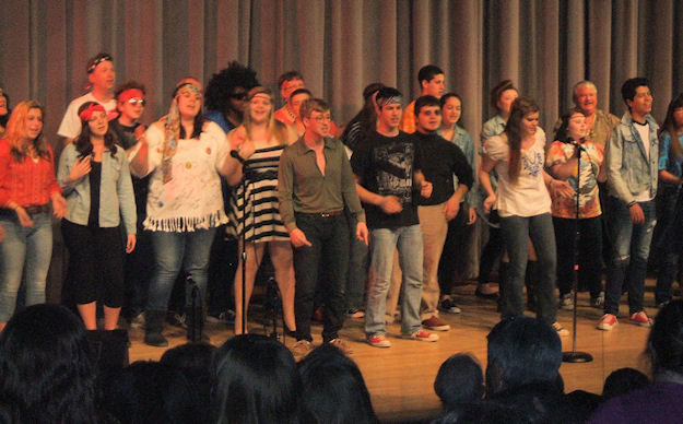 Members of the cast sing "Joy to the World" a tune from the early seventies by Three Dog Night