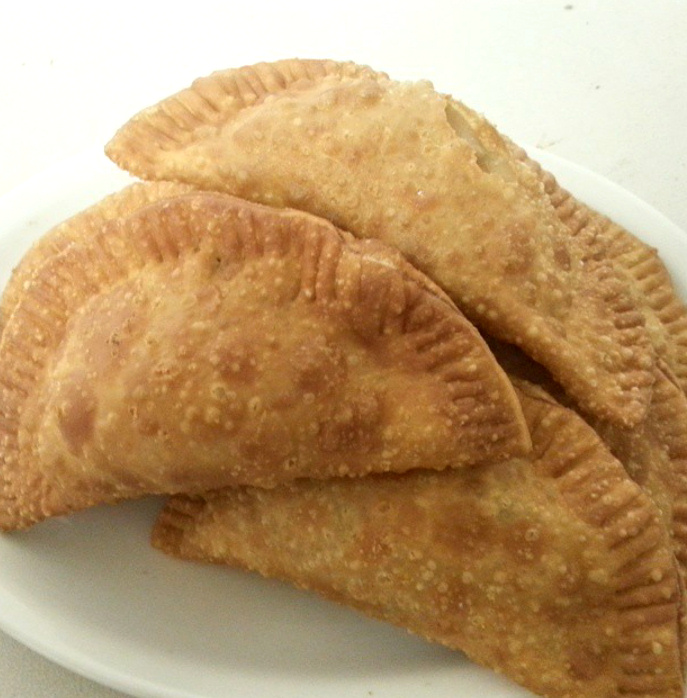 Homemade Sausage Spinach and Crab Empanadas. Photo provided