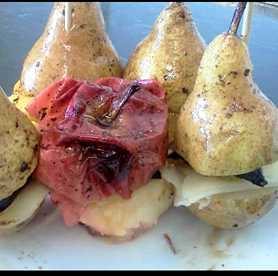 Rum Roasted Stuffed Pears with Aged Cheeses and Cured Meats. Photo provided
