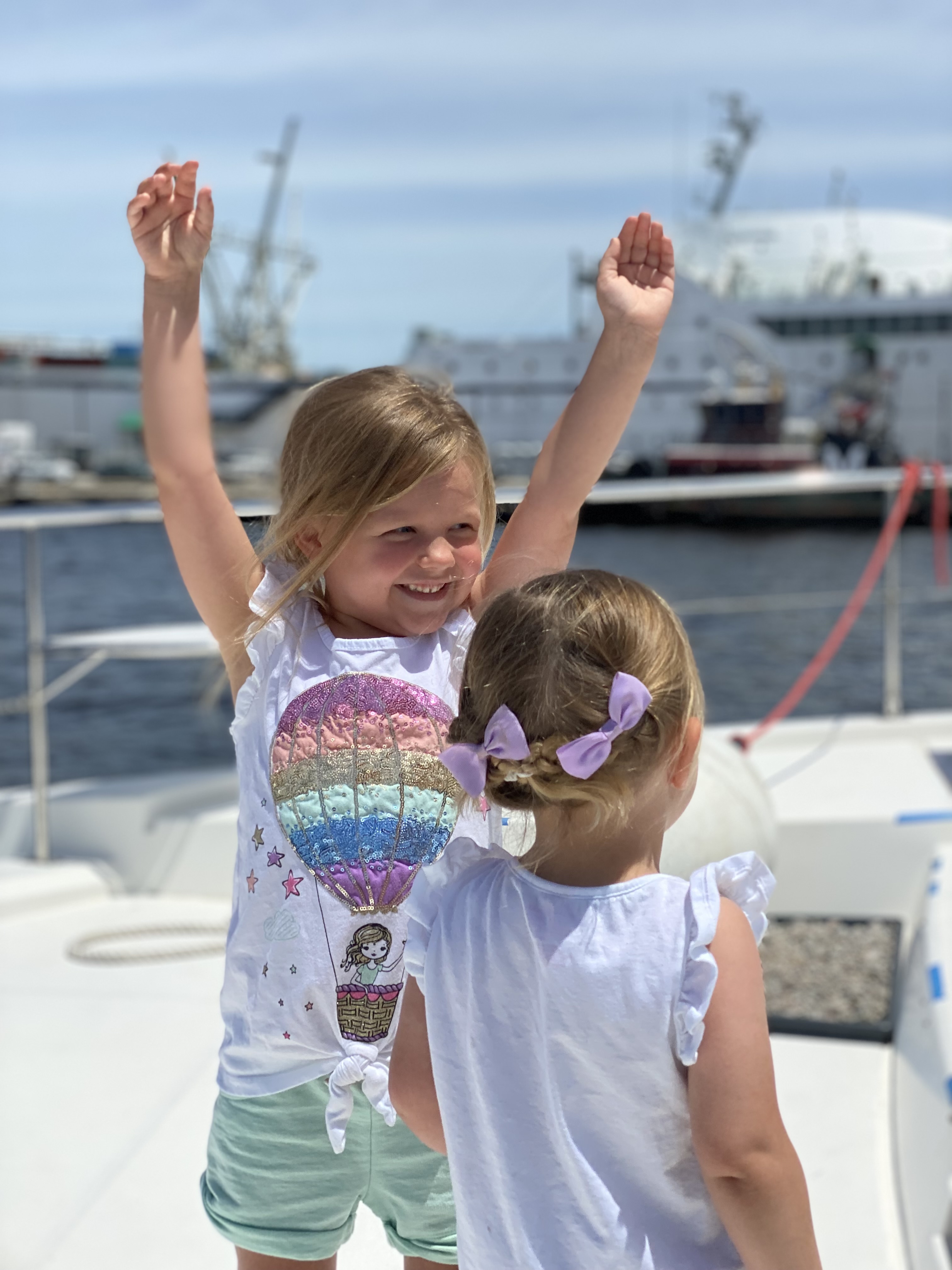 Frida Cat cruising into Baltimore with Margot at the Bow