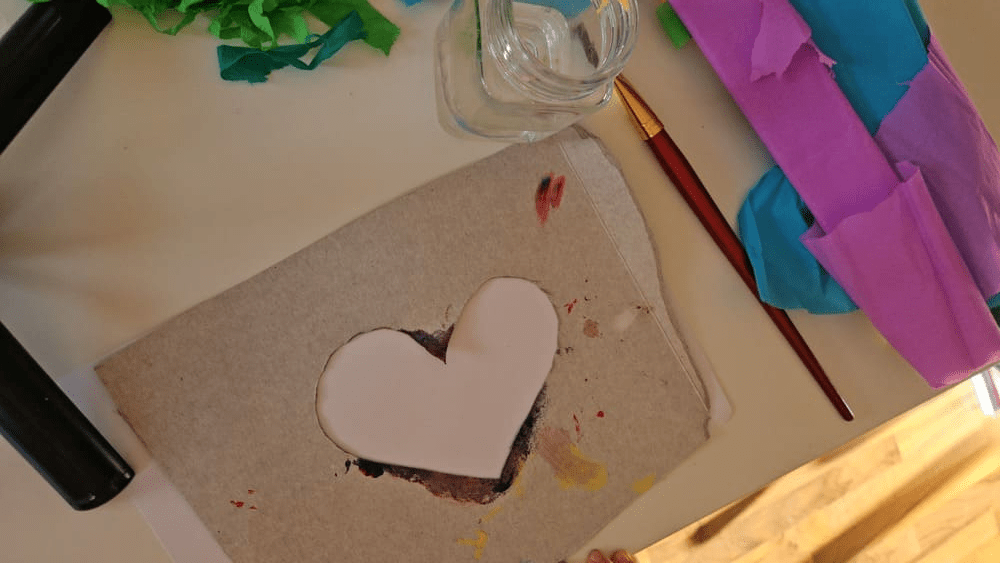 easy Valentine craft for toddlers bleeding tissue paper hearts