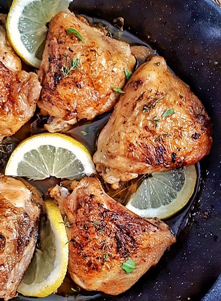 These easy-crispy garlic lemon chicken thighs are pan-seared to brown then oven baked to cook through. This recipe is keto, low carb and whole30 meal. 
