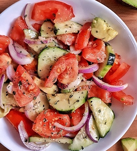 Cucumber tomato salad is refreshing and easy low carb and whole30 side dish that's perfect to throw together on a hot summer day! #salad #keto #lowcarb