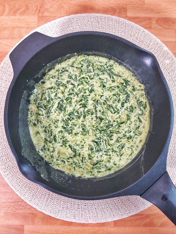 Creamed spinach is an easy homemade side dish that is also healthy, low carb and keto-friendly. #keto #ketosidedish #holidays