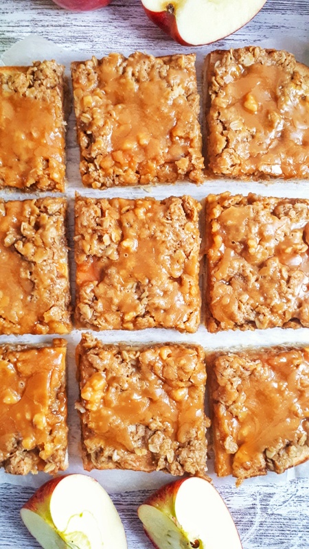 Paleo Apple Pie Crumb Bars are a delicious fall treat that combines a shortbread crust with apple pie and crumble topping. Perfect for holiday parties!