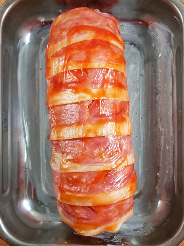 The best low carb and ketoBest Keto Bacon Weapped Cheese Stuffed Meatloaf recipe that itÂ´s tender and juicy on the inside and topped with a zesty topping!