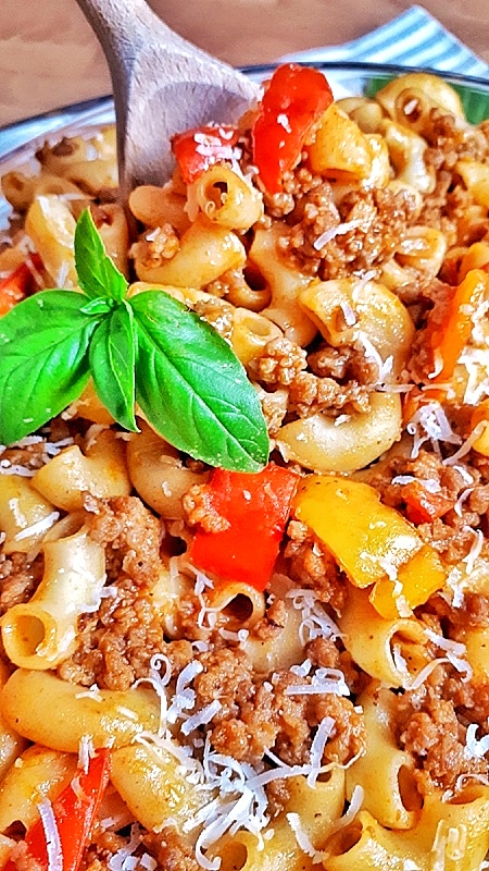 American Goulash is an easy, one-pot, classic comfort food made with ground beef, tomatoes, and macaroni noodles that comes together in 30 minutes. #goulash #comfortfood