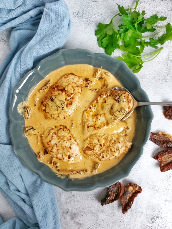 This quick and easy Marry Me Chicken Recipe features boneless chicken breasts with a sun-dried tomato creamy sauce made with heavy cream and parmesan cheese.