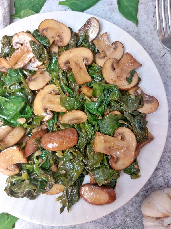 Sautéed mushrooms with spinach is a simple, delicious, and nutritious side dish that fits into any diet. Quick, easy, and perfect for any occasion.