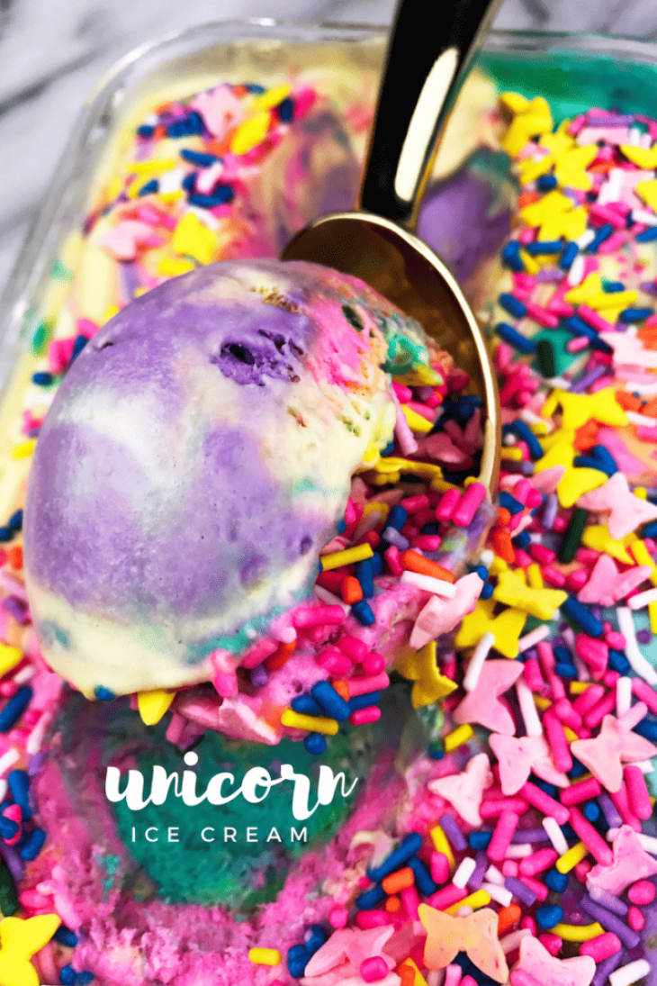 Rainbow Unicorn Ice Cream Recipe - Unicorns may be imaginary magical creatures, but we're still ready to celebrate them. Today's recipe does just that. It's a mixture of bright rainbow ice cream colors covered in sprinkles. This ice cream recipe is perfect for your next fantasy unicorn party celebration. Or just because it's fun and delicious. Either way. No judgment here.