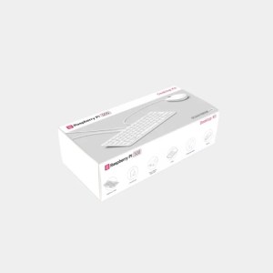 Emballage blanc du kit Raspberry Pi 500 montrant le clavier ordinateur et ses accessoires